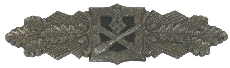 German WWII Close Combat Bar medal: B-119 Close Combat Bar - Bronze. Eagle/swastika, crossed bayonet/grenade - on a horizontal spray of oak leaves. Reverse marked "F.B & L.". Wide pin. II