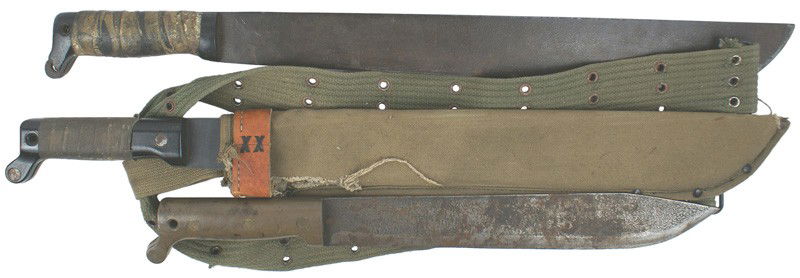 Lot of 3 U.S. M1942 machetes: D-45 Lot of 3 U.S. M1942 machetes: (1) As above, but a blued blade made by the "ONTARIO KNIFE CO.". Marked "U.S." Top of canvass sheath is damaged. With a pistol belt. (2) Same - marked "COLLINS & CO.