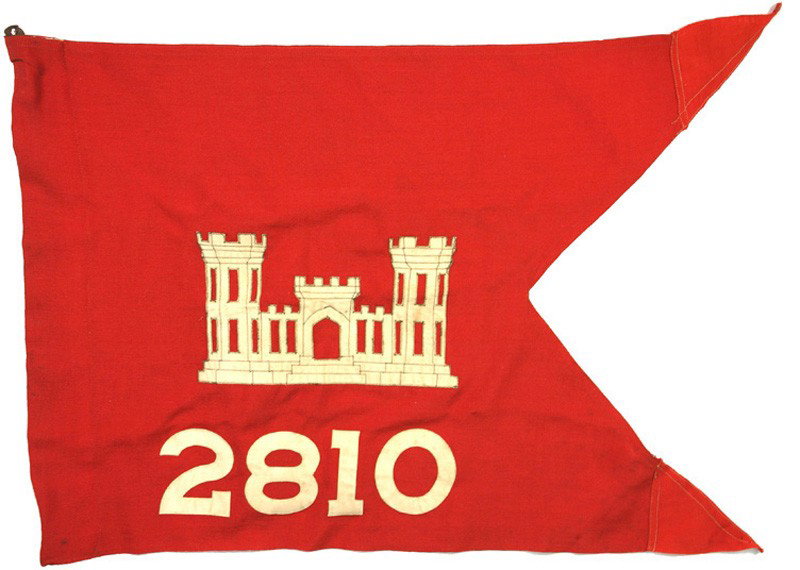 U.S. 2810th Engineer Battalion pennant flag: H-324 2810th Engineer Battalion pennant. Red 20" x 28 1/2" "swallow-tail" with a white sewn-on castle and "2810". Leather buttonhole tabs inside of sleeve. II