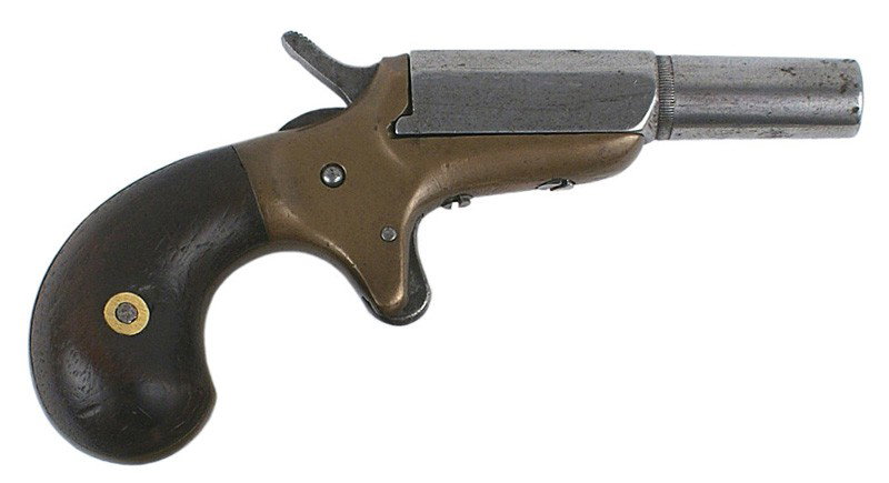 U.S. spur-trigger Derringer circa 1869: M-7 U.S. vest pocket spur-trigger Derringer. Circa 1869. Barrel marked "E. ALLEN & CO. MAKERS". .22 rimfire, breech loading, brass frame with a 2" octagon/round barrel. Pivots to right for loading. Se