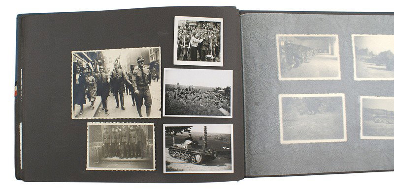 German WWII photo album NSKK member: L-8 Photo album of an NSKK member. Swastika and National Colors ribbon on cover. Included are photos of members, training, on review, working on motors, Panzers, weapon instructions, pill box, half-tr