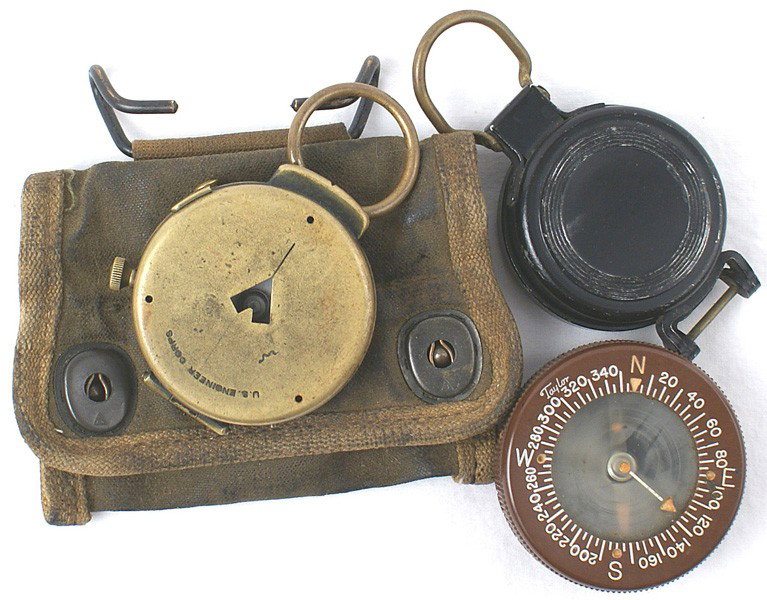 Lot of 3 U.S. Army combat compasses: N-39 Lot of 3 U.S. Army combat compasses: (1) WWII Lensatic compass with rear sight, etc. "44 CORPS OF ENGINEERS U.S. ARMY", "SUPERIOR MAGNETO CORP." Painted black. (2) WWI brass case with open sight 