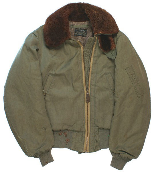 U.S. WWII FLYING NURSE B-17 jacket: F-86 WWII "FLYING NURSE TYPE B-17" jacket. O.D. with a simulated bearskin collar, two snap slant pockets (wear on one) and knit waistband and cuffs. Simulated fur lining. Some wear above cuffs and per