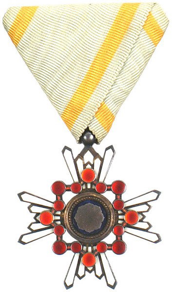 Japanese Order of Sacred Treasure medal: B-175 Order of the Sacred Treasure - 5th Class. Cross with white enameled arms (consisting of rays), a silver center and a ring of 16 red stones surrounding the center. Original triangular ribbon. II
