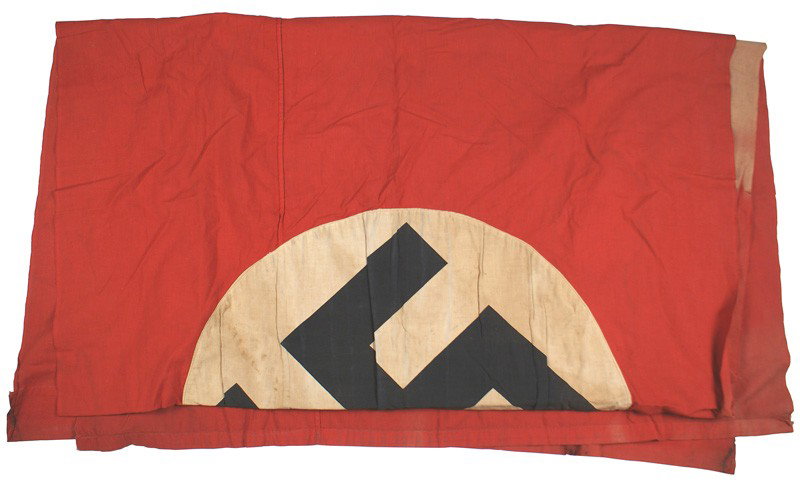 German WWII NSDAP banner flag: H-198 NSDAP banner. Black swastika printed on white circle, sewn to a red field. Soiled. 106" x 46". II-