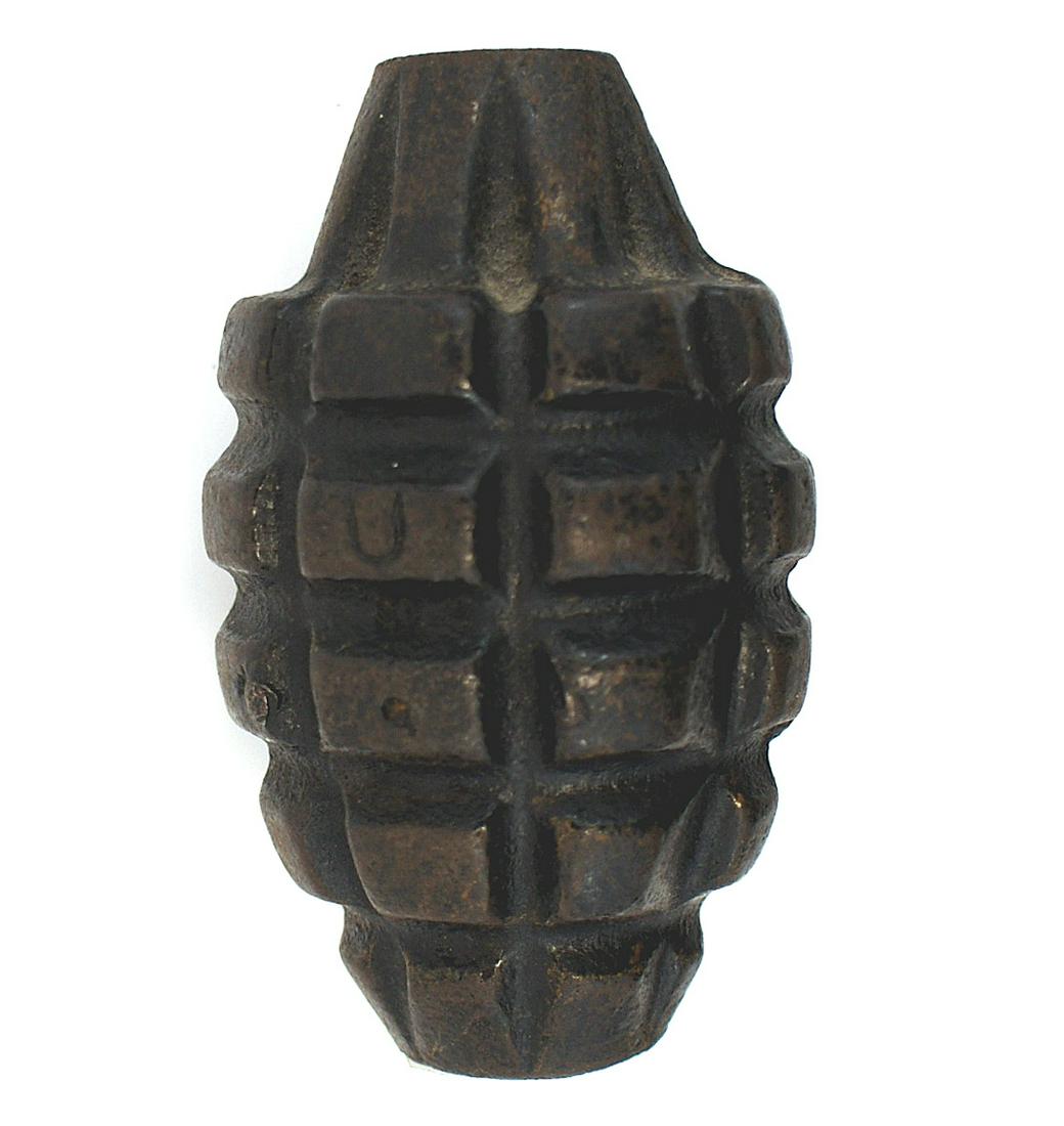 US WWI pineapple grenade: M-068 US WWI "pineapple" grenade. Iron body has 5 rows of relief rectangular panels, which divide into 40 fragments on detonation. Missing the entire lever assembly. II