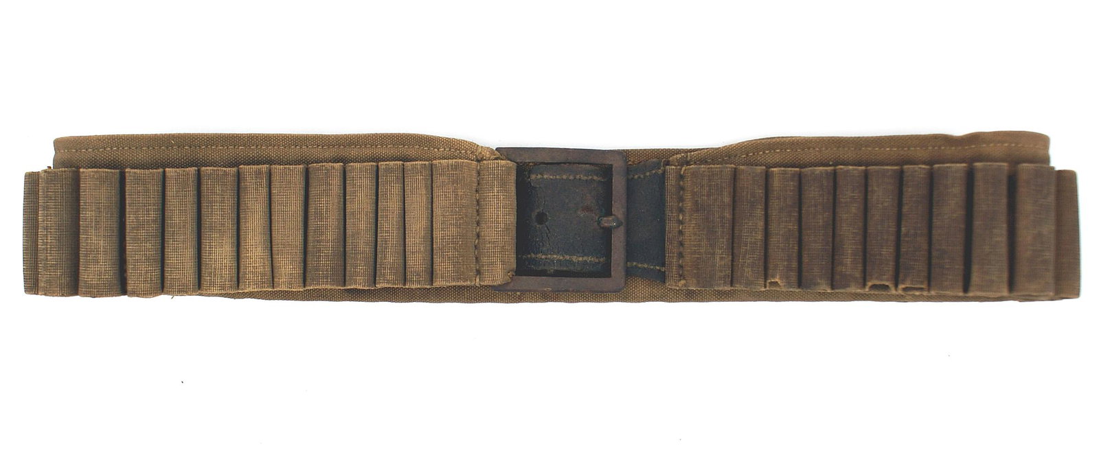 US Pattern 1876 cartridge belt: K-118 US Pattern 1876 cartridge belt. 2" wide drab colored canvas covering hemmed along the bottom edge. Three brass rings are also riveted to the lower back edge. Fifty-four, 2" cotton webbing loops 
