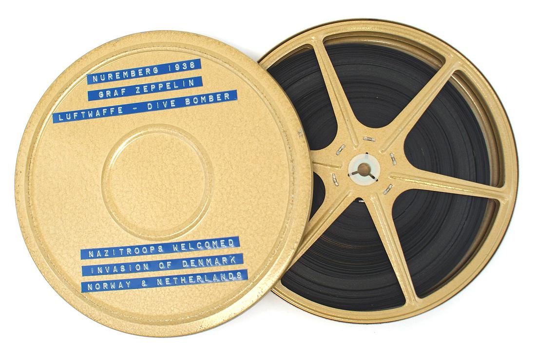 German WWII film reel NUREMBERG ZEPPELIN: L-022 German WWII 200 ft. reel of film: Contains "NUREMBERG 1938", "GRAF ZEPPELIN", "LUFTWAFFE-DIVE BOMBER", "NAZI TROOPS WELCOMED" and "INVASION OF DENMARK - NOWAY - NETHERLANDS". From the Donald G. 