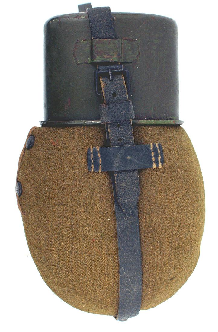 German WWII Army canteen: N-007 German WWII Army canteen. OD wool snap on cover. "SKU" marked. Original feld grau metal cup with retaining strap and belt snap hook. Excellent. I