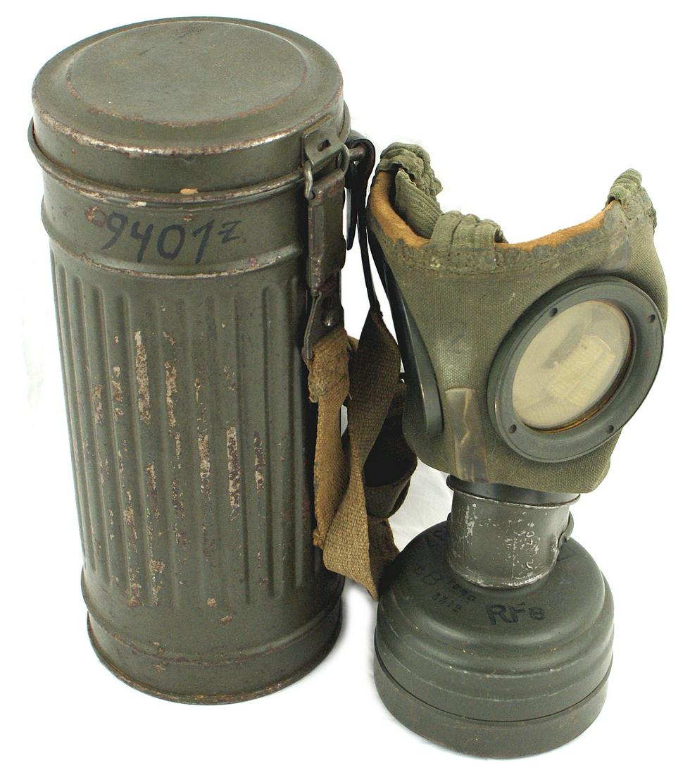 German WWII Army gas mask canister: N-008 German WWII Army gas mask/canister. OD heavy cloth face mask with rubber framed lenses and all straps and filter can. Marked "FE 37", "AB", "3319", "RF8", and with an eagle Waffen stamp and "194