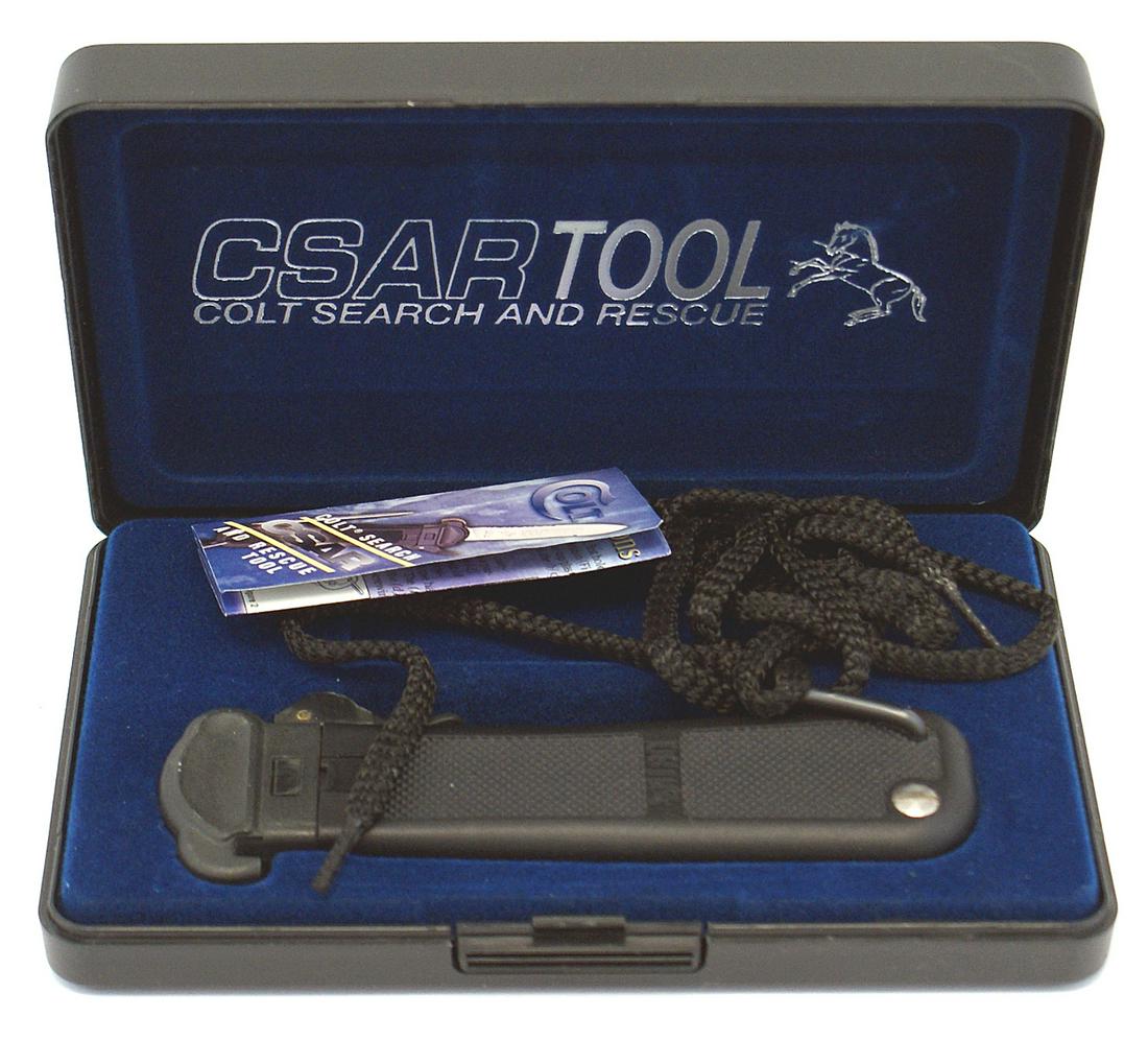 CSARTOOL Colt tool Paratrooper knife: D-092 "CSARTOOL" Colt search and rescue tool. Actually, a copy of the Bundswehr takedown Paratrooper knife. All magnetic metal construction with checkered grips. 3 3/8" excellent blade with a partial 