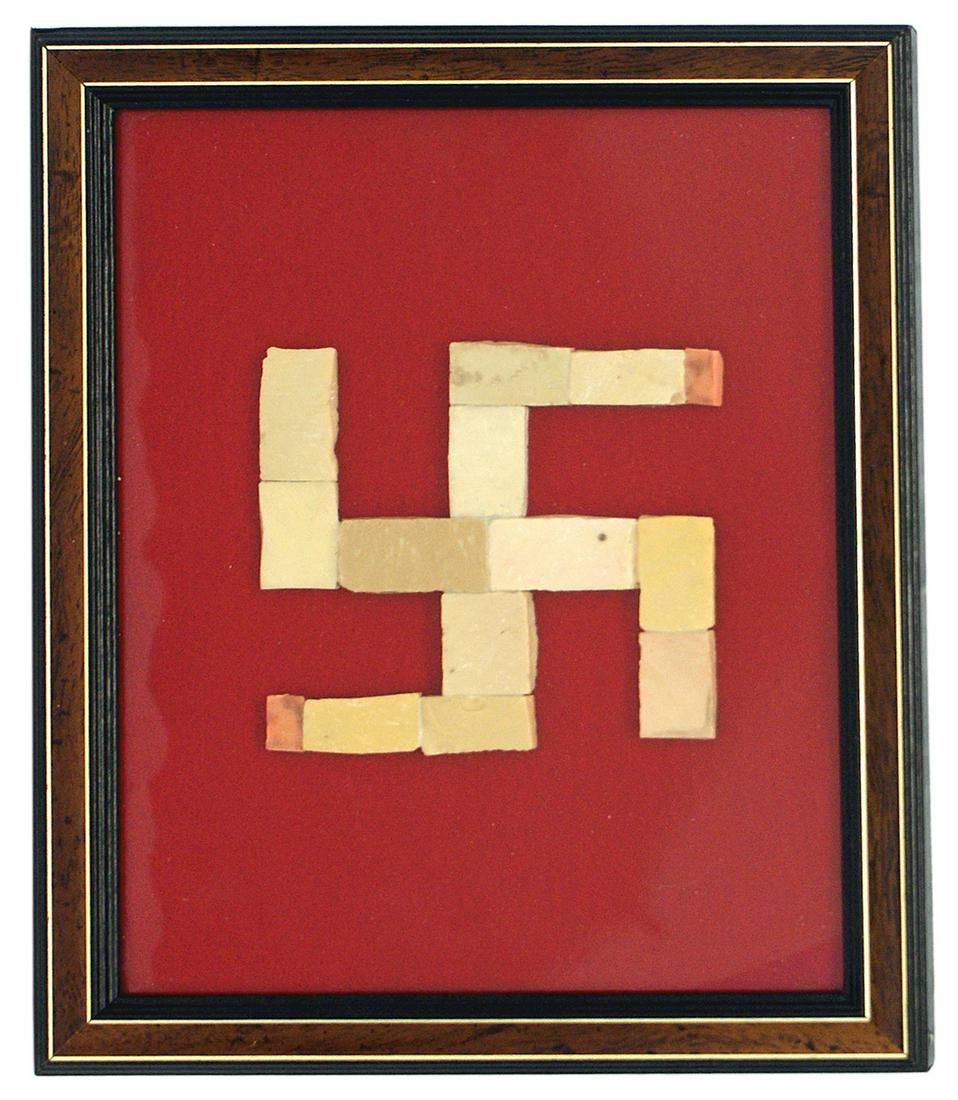 Framed ceiling tiles Hitler Fuhrerbau in Munich: A-013 Framed swastika made from ceiling tiles taken from the front porch of the "Fuhrerbau" in Munich. 4 3/4" x 4 3/8" swastika on a red background. Gilt inner boarder of the 9 1/4" x 11 1/4" mahogany
