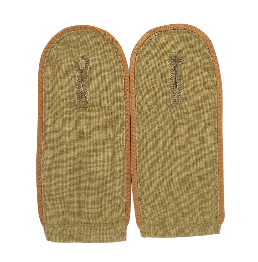 German WWII Panzer AK EM shoulder boards: H-020 German WWII Panzer Afrika Korps EM shoulder boards. Slip-on type. Subdued pink piping on tan. II