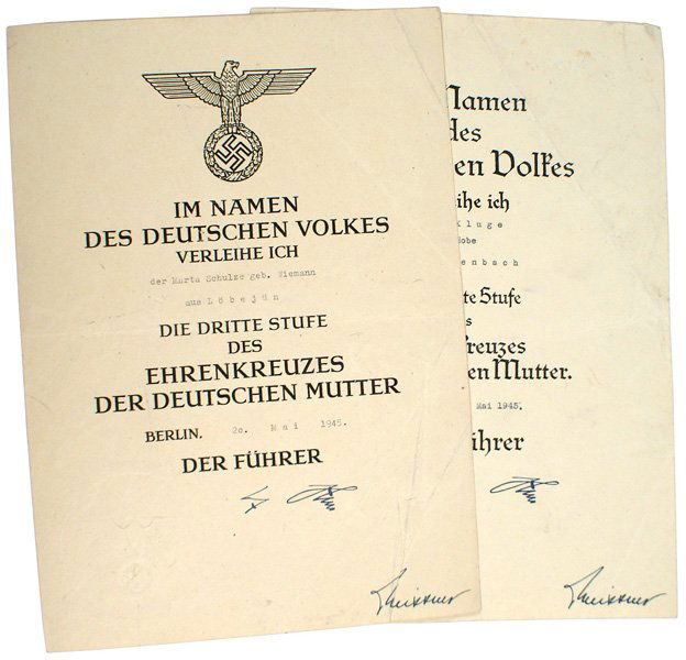 Lot of 2 citations German WWII Mothers Cross: C-3 Lot of 2 award citations for a 2nd and 3rd Class Mothers Cross. Both are named and have facsimile "Hitler" and "Meissner" signatures. Unusual in that they were predated to be issued on "20. Mai 19