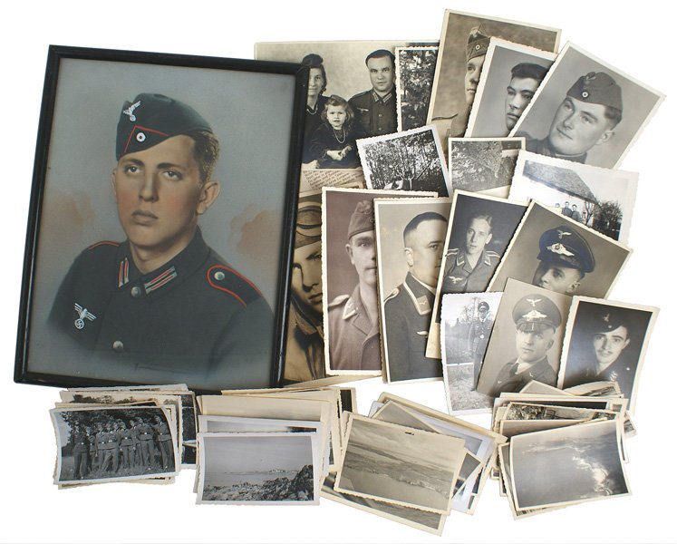 Lot of German WWII Army photos: L-12 Lot of WWII photos: (1) Framed color portrait of a young Artillery EM. Colored in breast and cap eagles and red cap piping, collar tabs and shoulder boards. 10” x 8”. (2) 5 postcard portraits
