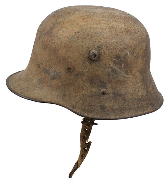 Austrian M1916 steel helmet: E-15 Same - aged mustard finish shows field use. With rusted liner band and well used issue cloth chinstrap. No liner. II-