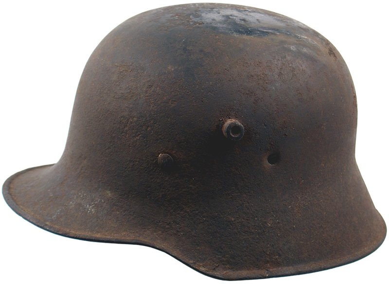 German WWI M1917 Stahlhelm helmet: E-31 M1917 "Stahlhelm". - pitted and patches of rust. Old weld on top of skull. Internally shows wear and rust. No liner. A relic acquired in Afghanistan. II