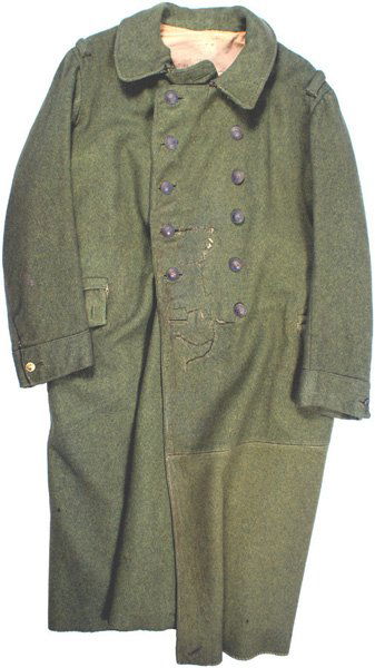 French WWI overcoat grenade buttons: F-33 WWI o'coat - but with two rows, of six each, darkened original flaming grenade buttons. Same buttons on back and belt, but no pocket buttons. Old repairs to tears on front. Number stampings in li