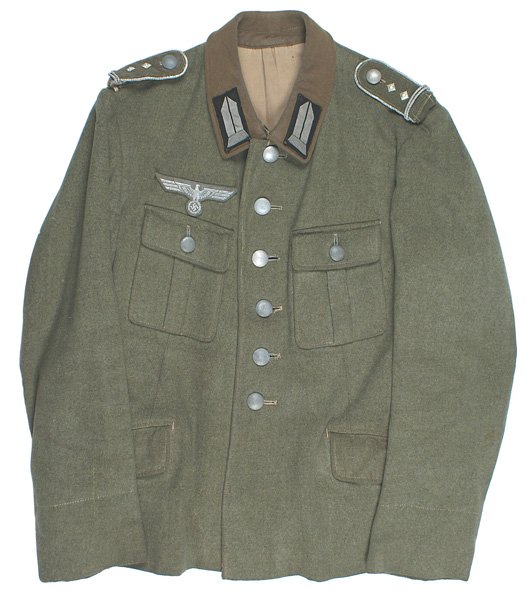 German WWII Labor Corps Hauptvormann tunic: F-44 Labor Corps rank of Hauptvormann service tunic. O.D. tunic with a brown collar and four "flap" pockets. Silver-gray parallelogram on black collar tabs (machine sewn). Flat silver wire on olive-gr
