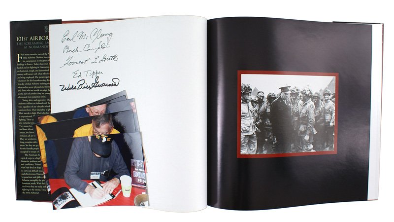 101st AIRBORNE book signed Band of Brothers: I-80 "101st AIRBORNE - THE SCREAMING EAGLES AT NORMANDY" by Mark Bando. The flyleaf is signed by five of the original members of Company E of the 506th PIR: Earl McClung, Buck Compton, Forest L. Guth,