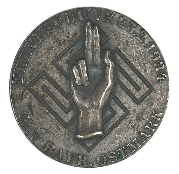 German WWII GAU 1934 Loyalty Day Badge: B-29 Silvered "GAU. BAYR. OSTMARK…25.2.1934" Loyalty Day Badge. Reverse maker marked. Darkened patina. II