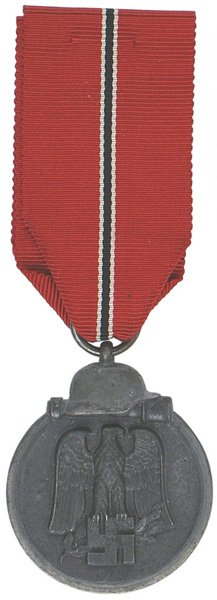 German WWII Eastern Front Medal: B-111 Eastern Front Medal. Darkened oxidized finish on silvered perimeter with a helmet/stick grenade. Obverse bears a relief gray-black eagle/swastika. Reverse: "WINTER BATTLE IN THE EAST 1941/42". R