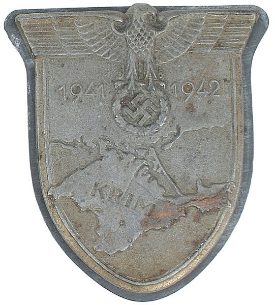 German WWII KRIM Shield: B-119 "KRIM" Shield - no cloth. Some light corrosion on the backplate. About II