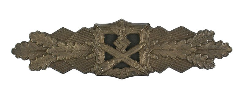 German WWII Close Combat Bar: B-138 Close Combat Bar - Bronze. Eagle/swastika, crossed bayonet/grenade - on a horizontal spray of oak leaves. Reverse marked "F.B & L.". Wide pin. II