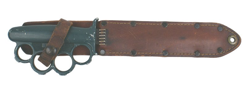 U.S. WWII Everitt Knuckle Knife: D-29 Everitt Knuckle Knife. One-piece cast aluminum handle with "knuckles". Marked in relief "EVERITT" - painted green. 6 7/8" double-edged darkened blade with an arrow center fuller. Edge had been sh