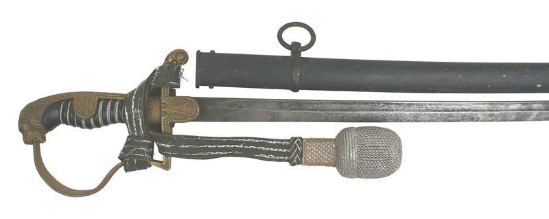 German WWII Army officer dress sword: D-61 Army officer's dress sword. Darkened brass lion head (with red glass eyes) pommel/oak leaf decorated backstrap, reverse "P" knuckle-bow and crossguard with a Political type eagle/swastika. Silver