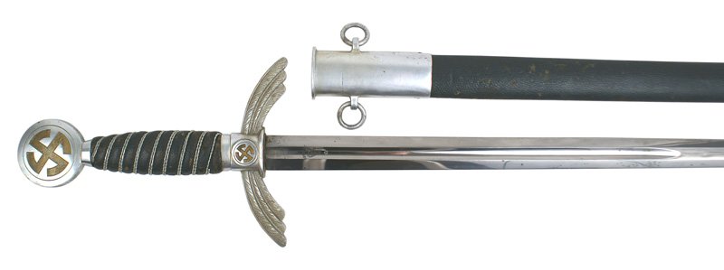 German WWII Luftwaffe officer dress sword: D-65 Luftwaffe officer's dress sword. Aluminum pommel and winged crossguard - both with a dull gold "sun-wheel" swastika. Silver wire wrapped blue leather grip. Clean 30 1/8" straight blade marked wit