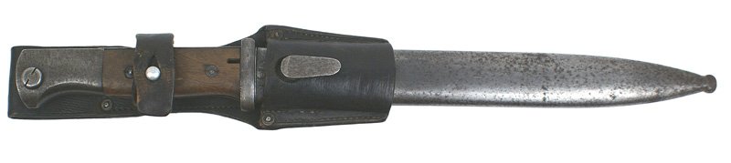 German WWII K98 bayonet: D-89 German WWII K-98 bayonet - with wood grips. Metal fittings have grayed. 95% blue finish on 10" blade. Marked "3978kk" and "43asw". Finish worn on matching numbered scabbard. Leather frog shows we