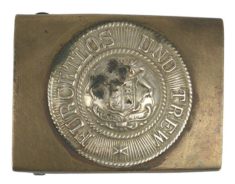 Wurttemberg WWI EM belt buckle: H-6 Wurttemberg WWI EM belt buckle. Nickeled roundel with the state coat-of-arms and "FURCHTLOS UNO TREUE" - on a brass buckle. II