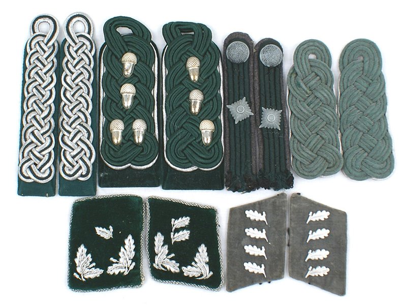 German WWII Lot Forestry Official uniform insignia: H-73 Lot of Forestry Official's uniform insignia: (1) Collar tabs - Army Forestry, silver bullion leaves on green velvet; Private Forestry - metal leaves on gray velvet (were removed from a uniform). 