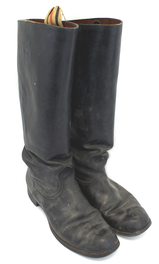 Pair of German WWII officer dress boots: N-008 Pair of German WWII Military Officer's dress boots. Original leather soles and heels with metal "horseshoes". Size approximately 9 1/2. Smooth 12" black leather shafts. II+