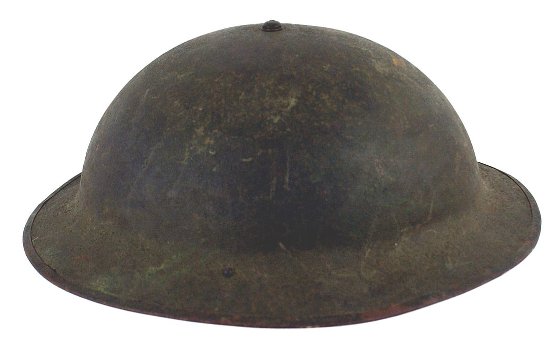 US M1917 A1 helmet: E-176 US M1917 A-1 helmet. O.D. sand finish. Web chinstrap and four-section wide leather tongue liner. Leather pad in top. With name "Renfeldt" and serial number. II