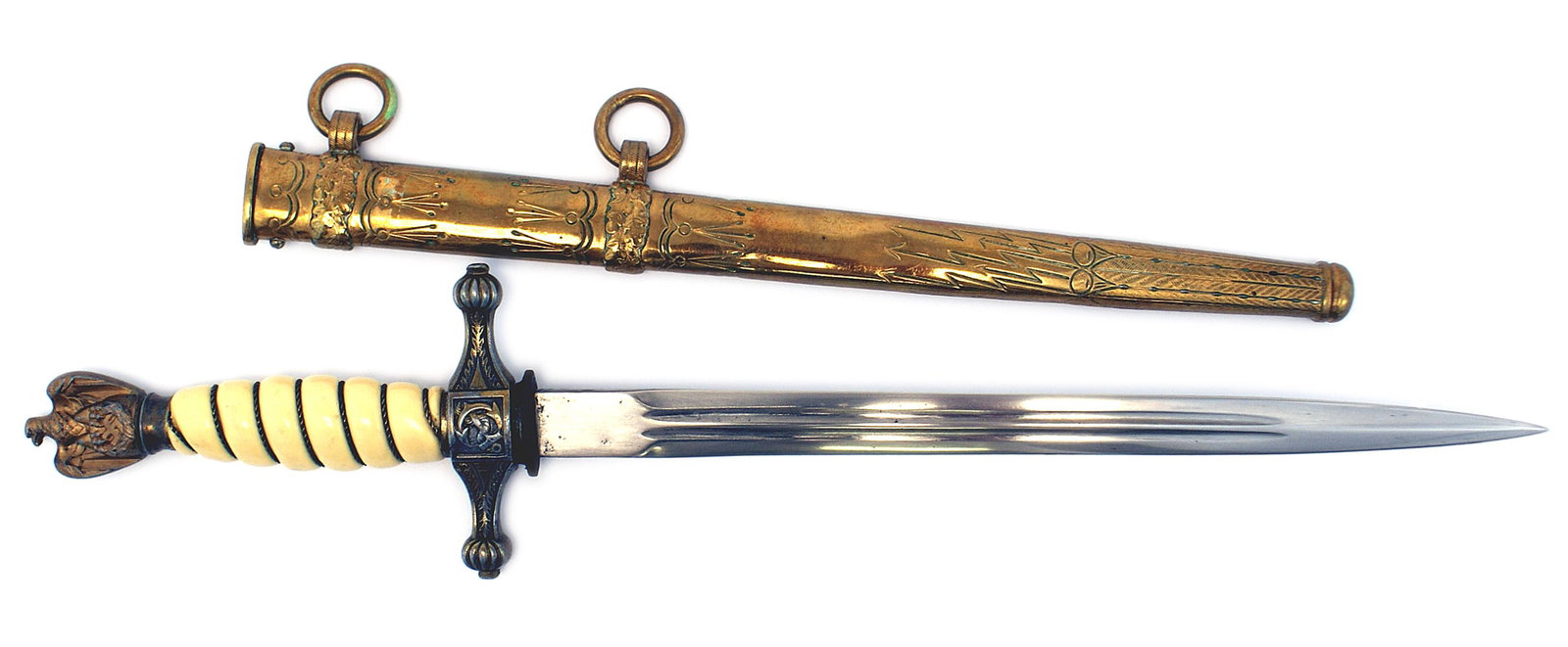 German WWII Navy dagger: D-047 Third-Reich Navy dagger. Even age patina on the well defined gilt eagle/swastika pommel and anchor decorated crossguard with rounded finials. Braided age toned gilt brass wire wrapped off-white