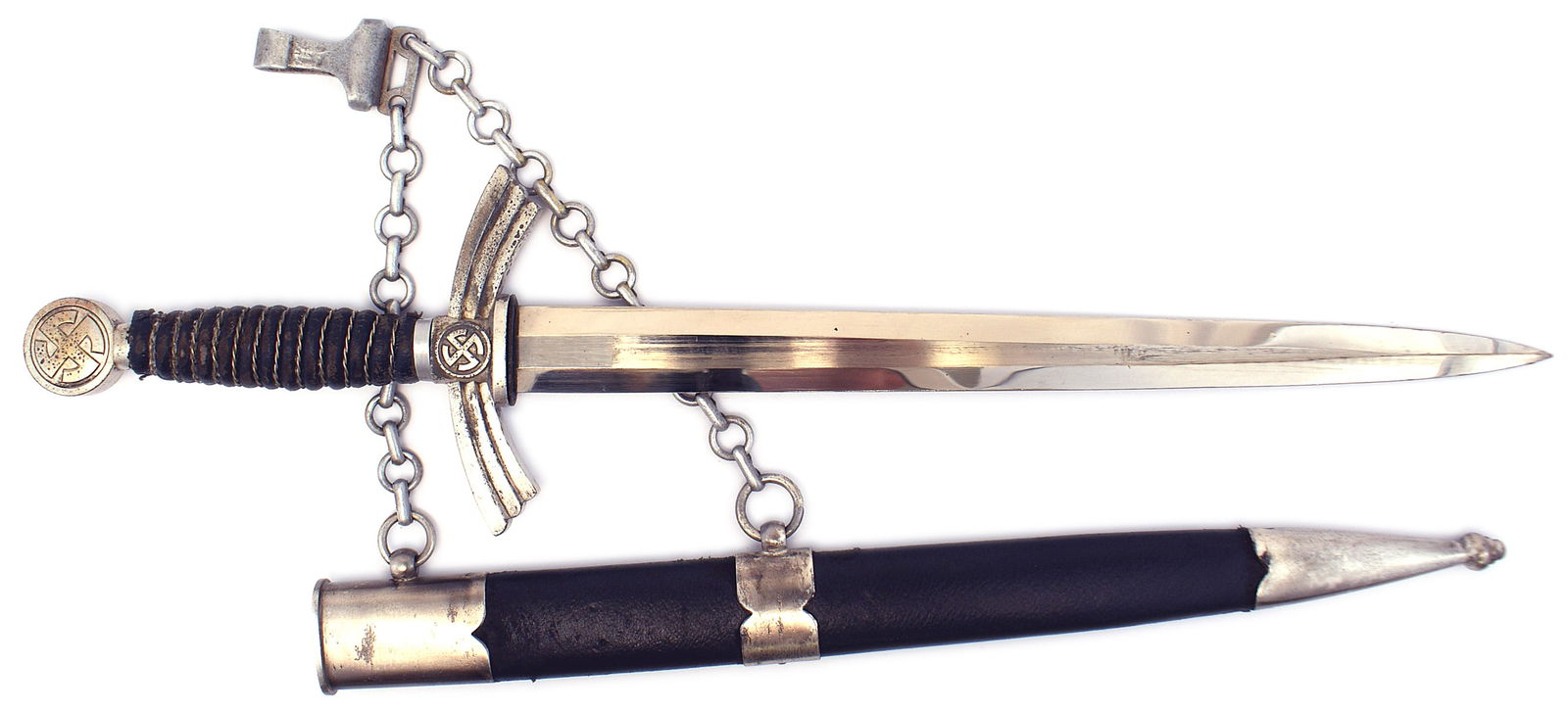 German WWII Luftwaffe 1st Model dagger: D-056 German WWII Luftwaffe 1st Model dagger. Brass finish is worn on the "Sun wheel" swastika on pommel and center of the winged crossguard. Wire wrapped leather grip. Clean 11 7/8" blade. Fittings h