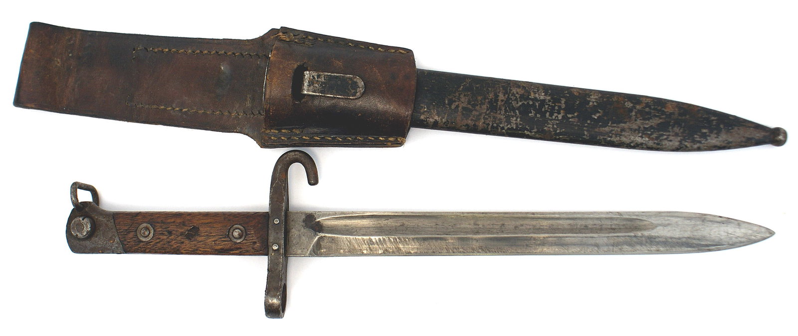 Austrian M1895 Mannlicher bayonet: D-141 Austrian M1895 Mannlicher bayonet. Steel pommel with an attached bayonet loop. Wood grips. Crossguard with a hooked quillon/muzzle ring. 9 5/8" reversed blade - with the edge facing upward, show