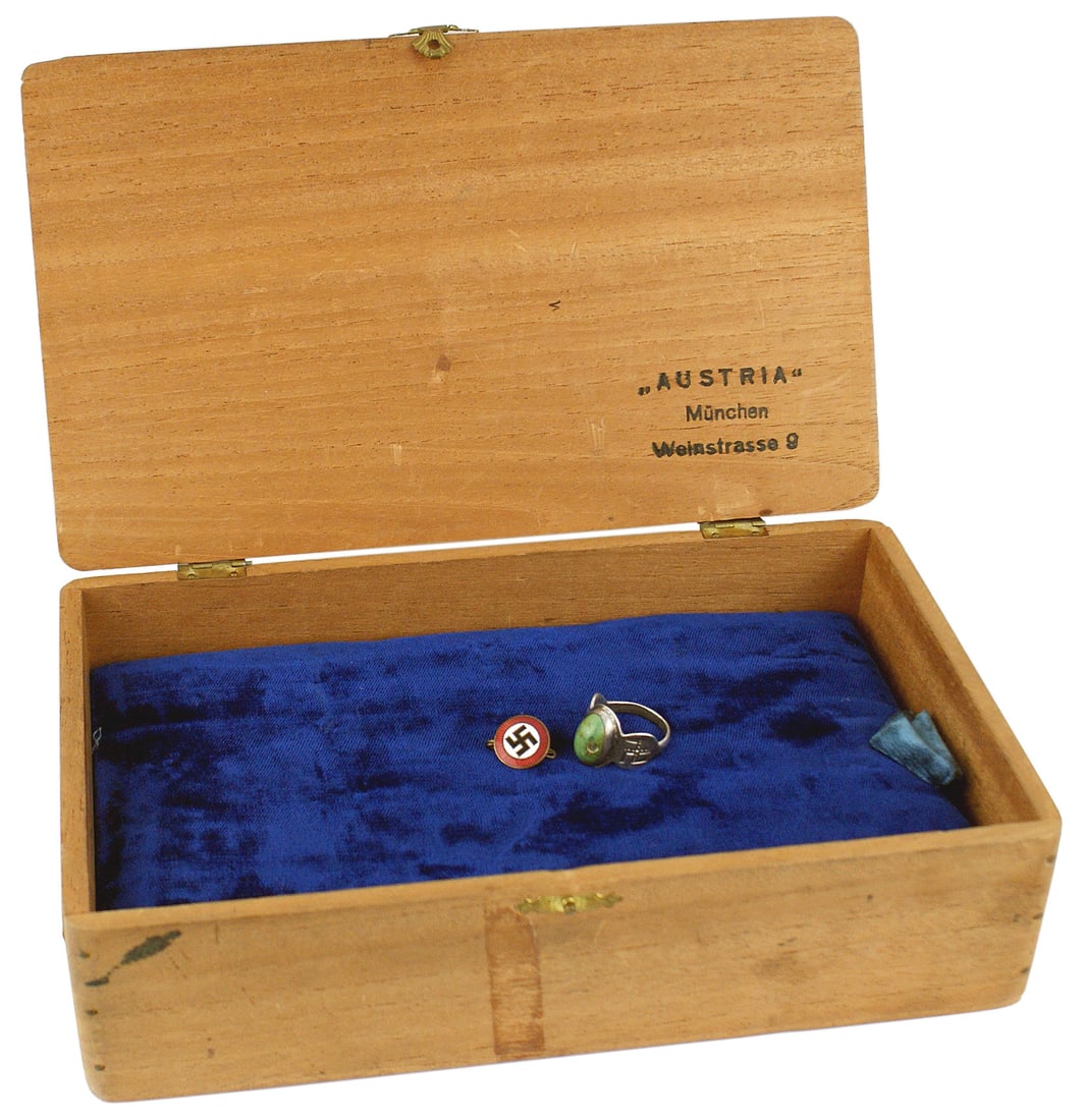 Cigar box Adolf Hitlers housekeeper NSDAP Badge ring: A-007 Wood cigar box with two of the original items it housed, from the estate of Frau Anne Winter, Adolf Hitler's private housekeeper. She was employed in this position from 1929 to 1945. Being a tru