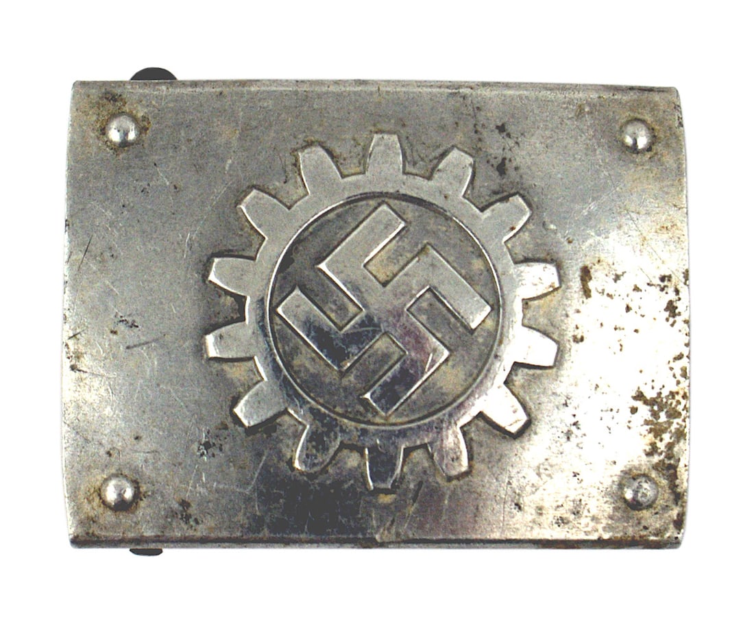 German WWII DAF Labor Front belt buckle: H-003 DAF (German Labor Front) belt buckle. One piece aluminum with a relief large tilted swastika within a cog wheel. Reverse marked "RZM" and "M4/24". II