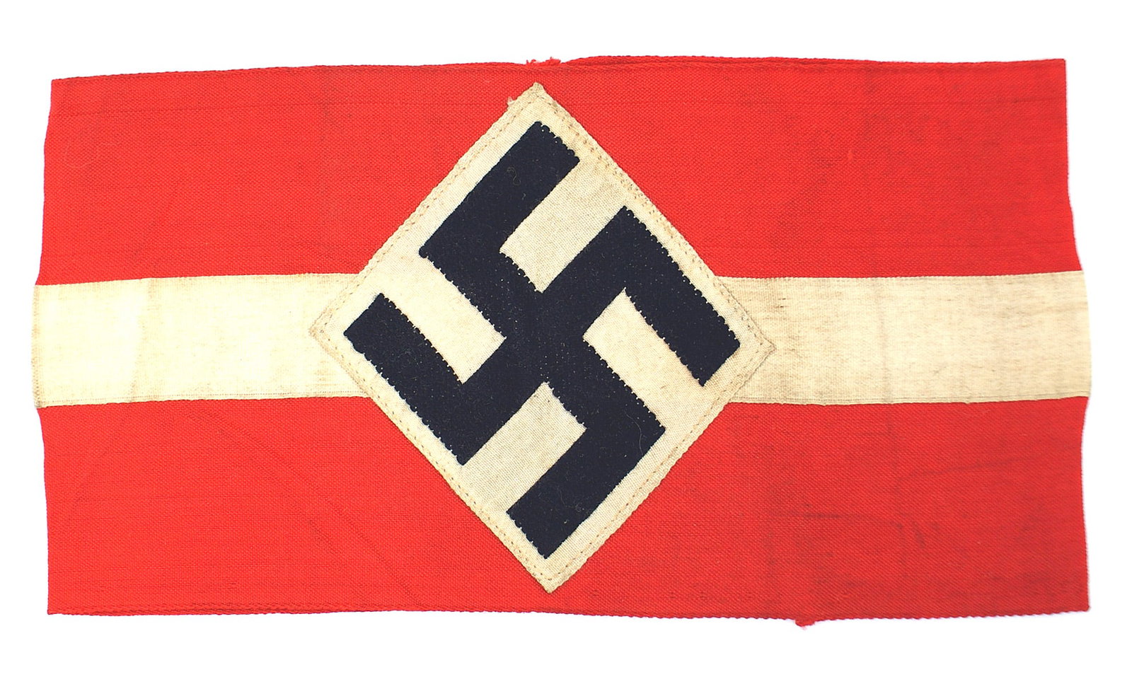 German WWII HJ Hitler Youth armband: H-014 Third-Reich H.J. (Hitler Youth) bevo embroidered armband. Black tilted swastika on a white diamond sewn on a red field with a center sewn white band. II