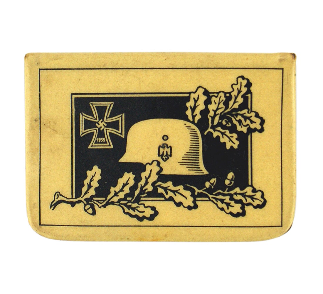 German WWII soldier souvenir match box holder: H-116 German WWII soldier's souvenir enameled "Kriegjahr 1939 - 1940", match box holder. One side is decorated with an Iron Cross, helmet and oak leaves. The other has a column of marching troops (chi