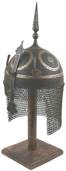 Museum copy of Persian Kulah Khud helmet: R-9 Museum copy of an 18th-19th century Persian "Kulah Khud". Bowl is incised with floral patterns and intricate designs along the base of the rim. Tall spike with gold washed floral designs and gold 