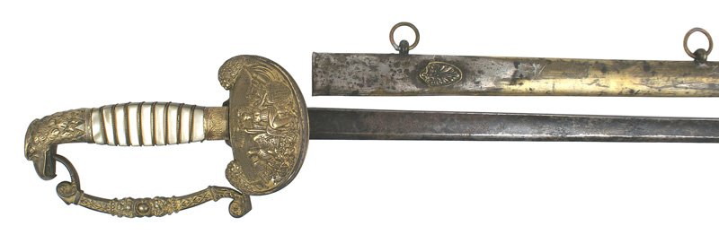 U.S. Infantry officer eagle head dress sword: K-7 Infantry officer's eagle head dress sword. Some traces of gilt on the eagle head pommel, stylized knucklebow, and large clamshell guard (with a relief allegorical figure of America/shield/liberty 