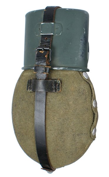 German WWII Army issue canteen: N-1 German WWII Army issue canteen. OD felt cover, green cup and leather strap/belt snap. II