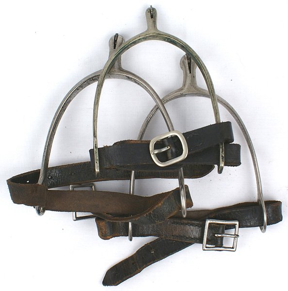 Three pair German WWII cavalry spurs: N-51 Three pairs of German WWII cavalry spurs. All with small rowels and leather straps. II