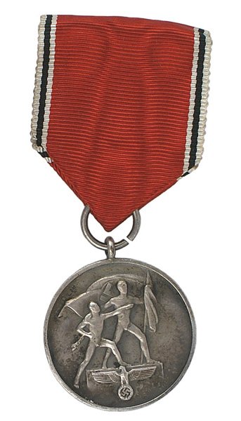 German WWII Anschluss Medal Austria Annexation: B-127 German WWII Anschluss Medal-Annexation of Austria. Obverse: two unchained figures holding a Nazi flag, also an eagle holding a swastika. Reverse: "13. MARZ 1938". Pin-back ribbon. II