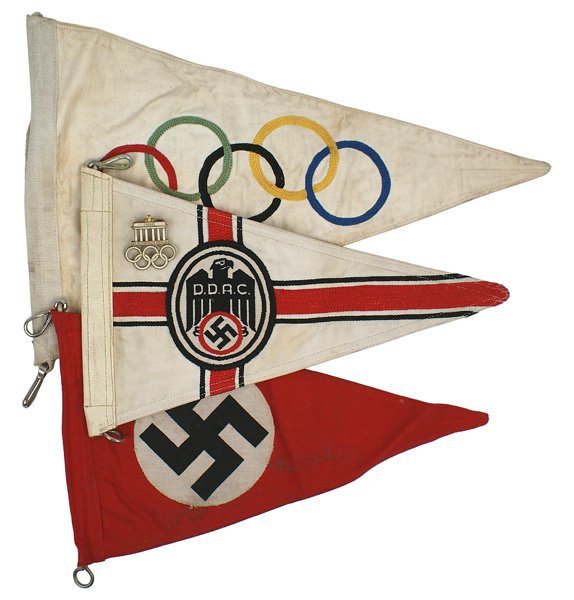 Lot of 3 German WWII automobile pennants: S-3 Lot of three automobile pennants acquired by an American college student while traveling in Germany during the summer of the 1936 Olympic Games. Included are: (1) NSDAP fender pennant. Printed bla