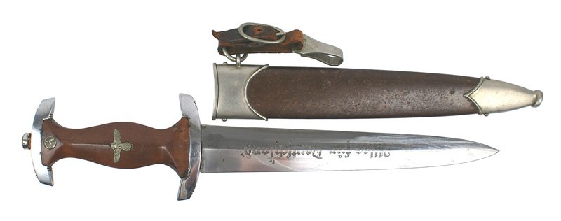 German WWII SA Dagger: D-6 German WWII SA Dagger. Early rosewood grip with "SA" and eagle insignia. Slight "dimples" on crossguard-border touching the grip. Blade appears to be a reproduction-marked "RZM" and "M7/73". Origi
